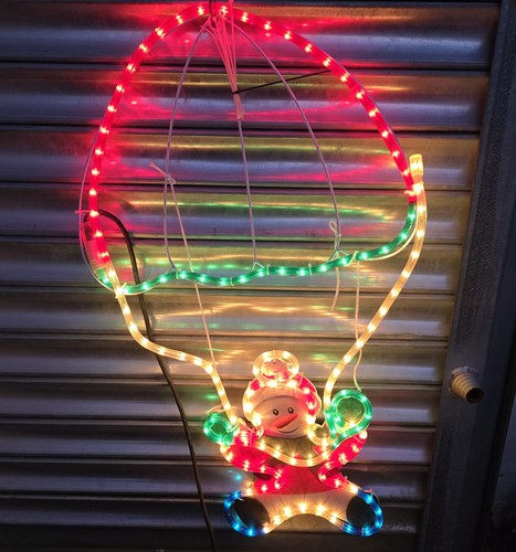 Christmas parachuting snowman